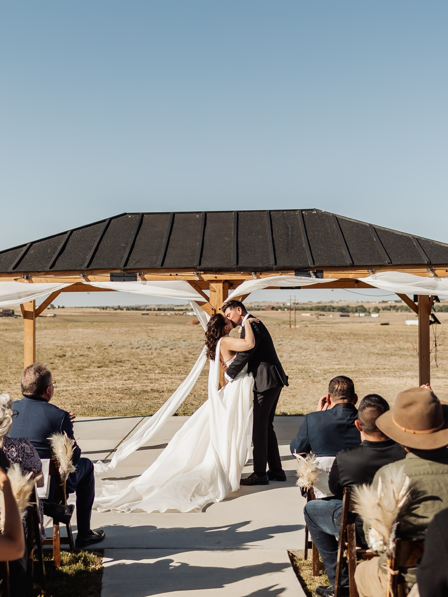 Nicole and Ase | June 13, 2026
These two are PURE JOY.
Nicole and Ase celebrated surrounded by the people who built so much of the day with their own hands. Their family property became the venue, Ase’s family built the patio and gazebo, cooked an incredible homemade Mexican feast, and served every guest with so much love. Every detail reflected community, generosity and celebrating exactly how YOU want. Also I loveee a DARTY 🙃
~ Vendor team ~
Venue: Ase’s family property
Coordinator: Celina @downtheaisle_co
Photography: @kalenjessephotography_co
Dress: @saintbridal from @bride.kc
Suit: @calvinklein from @menswarehouse_
Rings: @brilliantearth @kayjewelers
Hair + Makeup: @beautify.bfl
DJ + MC: @moonlit.djz
Bartending: @makeitadouble.llc
Officiant: Jalen, Ase’s Best Man.
Florals: @costco (recommended)
#denverphotographer #denverweddingphotographer #denverengagementphotography #coloradoweddingphotographer denverelopementphotographe