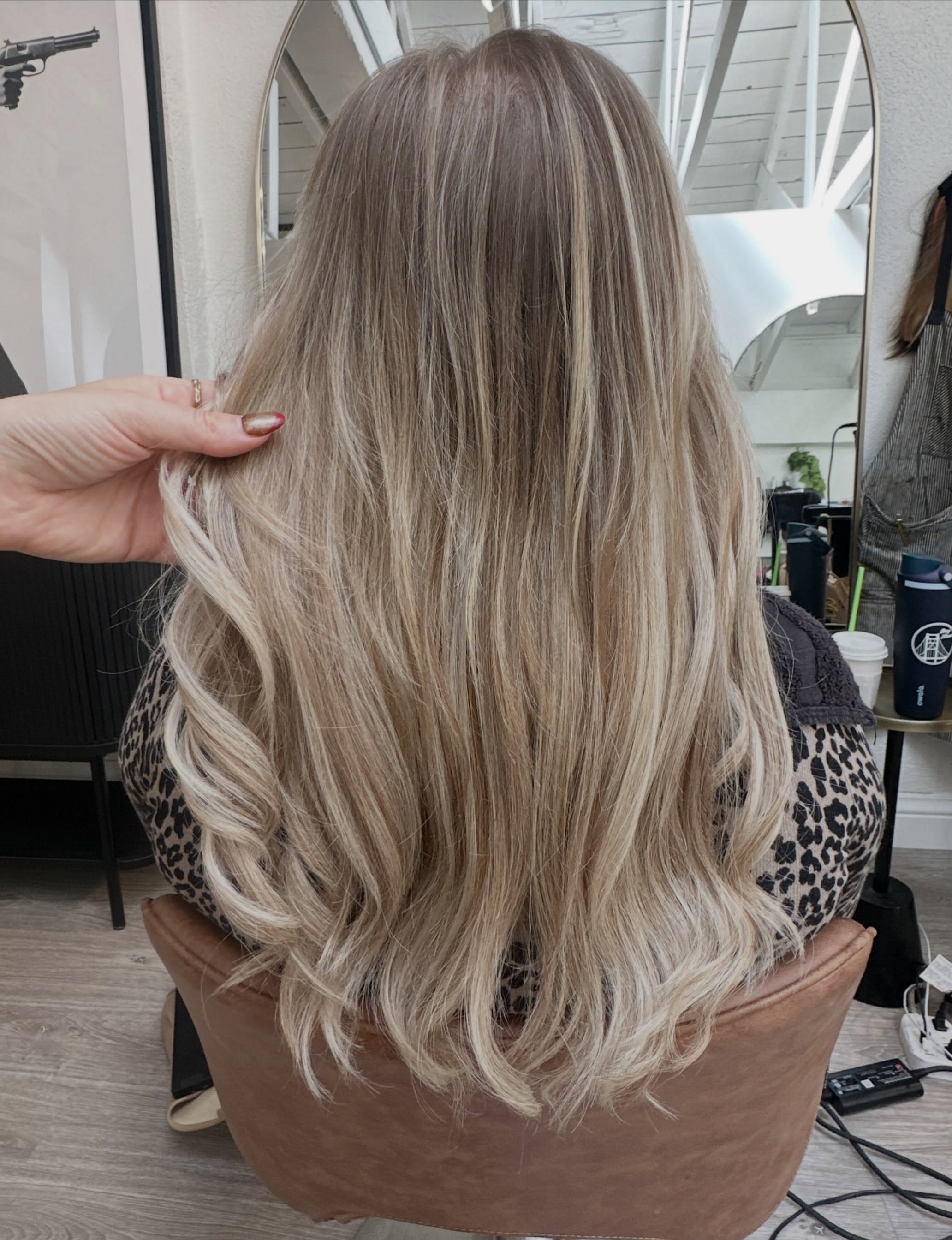 2 rows can make all the difference without being too heavy 👏
For this blonde extension transformation, her top row is only 2 layers of 14” @greatlengths_official Genius Wefts, and her bottom row is 3 layers.
Great Lengths Genius Wefts are incredibly thin and lightweight, but still give you so much fullness and volume—a little can go a long way. We also used her blonde weft extensions to add brightness and dimension in all the right places, so she can rely more on her extensions for that pop of blonde and less on lightening her natural hair.
The goal: longer, fuller, brighter blonde hair while keeping the integrity of her natural hair a priority 🤌
San Francisco hair extensions | SF extension specialist | Great Lengths extensions | Genius Wefts | blonde extensions | weft extensions | dimensional blonde | healthy blonde hair
Her extensions worn “straight”. No hiding behind curls to blend.
Her hair before.